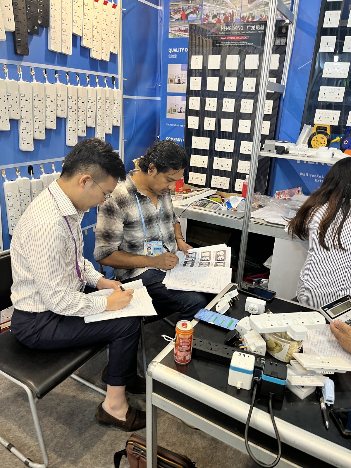 Customer noting selections at the Canton Fair booth